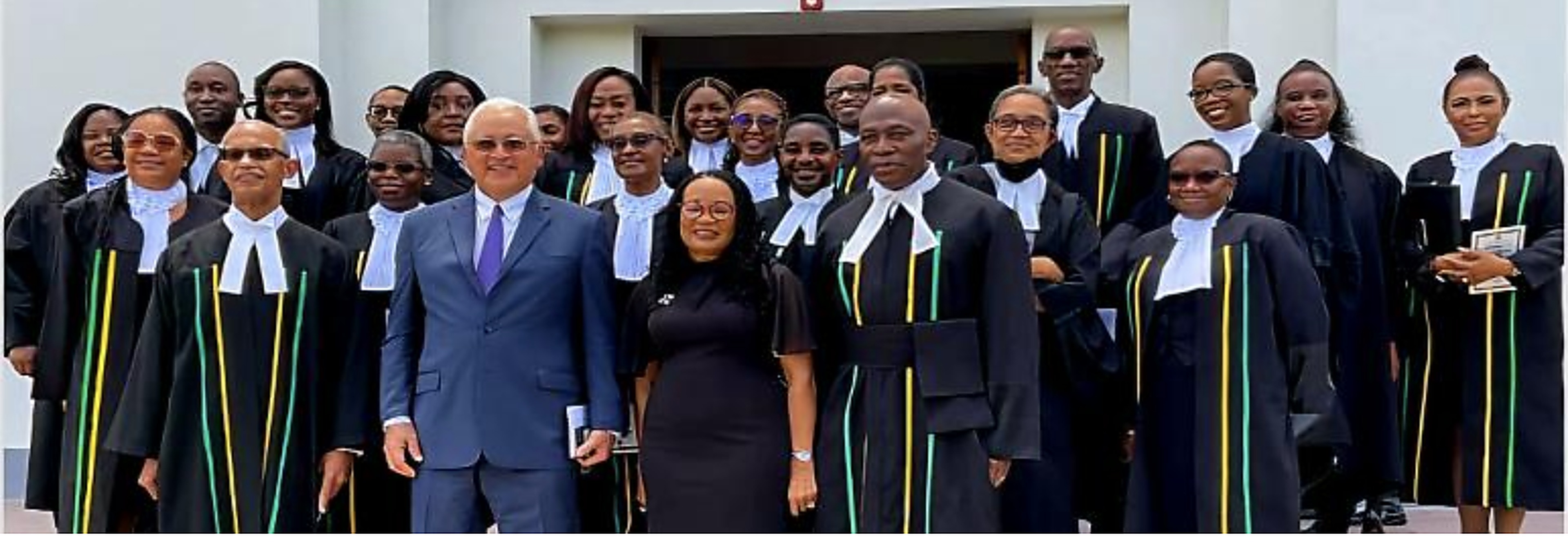 Members of the Jamaican legal profession in robes on court steps