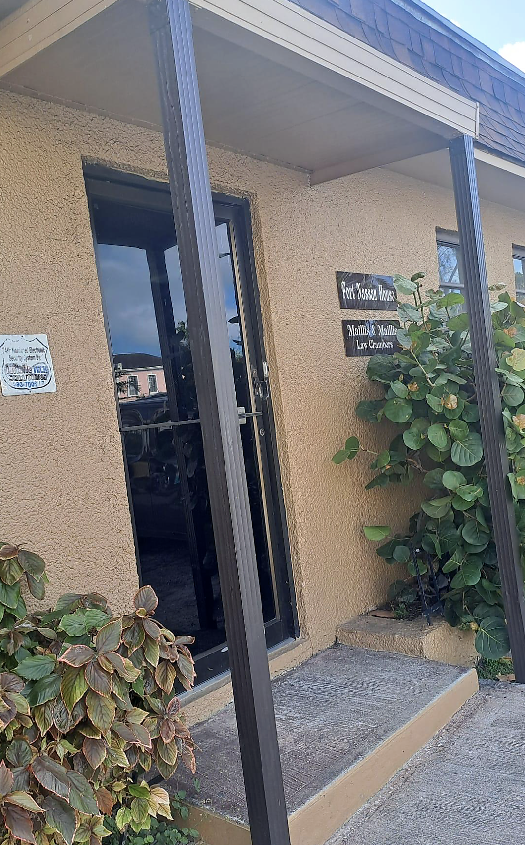 Port Nassau House entrance and Maillis & Maillis Law Chambers signage, Nassau, Bahamas